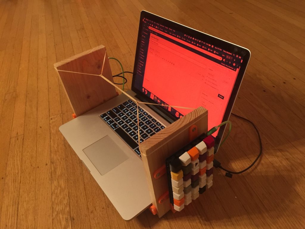 A laptop with a homemade vertical keyboard.